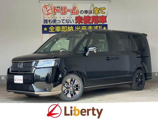 ステップワゴンスパーダ（ホンダ）ｅ：ＨＥＶスパーダ　被害軽減ブレーキ　レーンアシスト　前後ソナー　パワーテールゲート　Ｗエアコン　クルコン　ＬＥＤヘッドランプ　サイドカーテンエアバック　ＡＢＳ　スマートキー　キーフリー　シートヒータ　運転席エアバッグ 中古車画像