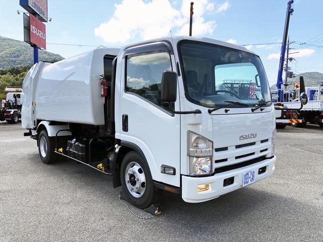 　回転プレス式パッカー車　６．５ｍ３　極東開発工業製　２．８ｔ積載　ワイド　ロング　連続単動積込切替　汚水タンク付　リヤシャッター式扉