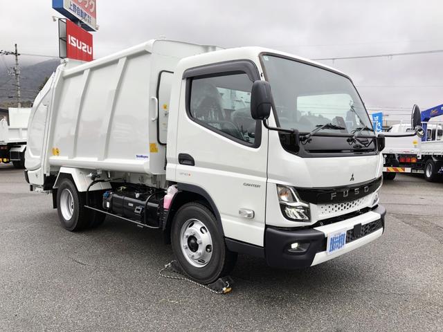 　プレス式パッカー車　７．０ｍ３　新明和工業製　２．８ｔ積載　標準幅　１１尺ミドル　連続積込　汚水タンク付　リヤシャッター式扉　ＬＥＤ作業中表示灯