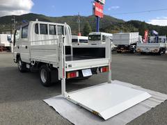 アトラストラック  Wキャブ 平ボディ 新明和垂直パワーゲート付 6人乗り 1550kg積載 標準幅 10尺 低床 4ナンバー 5速MT 脱着式幌付 中古車画像