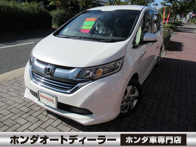 フリードハイブリッド ハイブリッド・Ｇホンダセンシング　純正ナビ　追突軽減ブレーキ　サイドカーテンエアバック　両側パワースライドドア　禁煙車　前方ドラレコ　レーンキープアシスト　スマートキー　ＥＴＣ　バックカメラ　オートＬＥＤヘッドライト　２列目窓カーテン（1枚目）