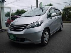 フリード G ジャストセレクション 1年保証付き 8人乗り 電動スライドドア 地デジTV ナビ 携帯リンク バックカメラ HIDオートライト 安全ボディ 禁煙車 キーレス ABS 電格ミラー ウォークスルー Wエアーバック 中古車画像