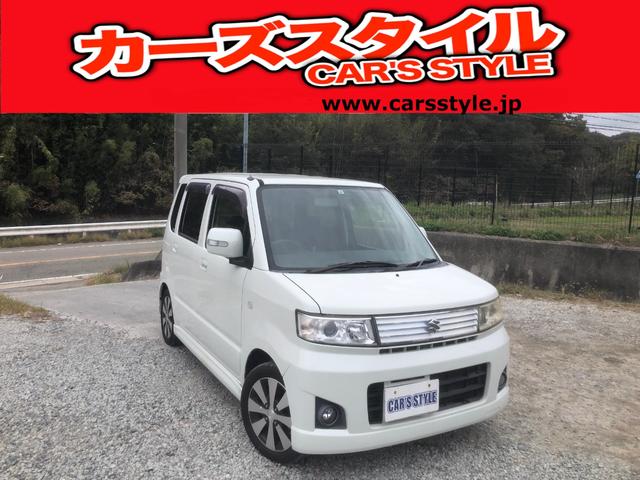 ワゴンＲ(スズキ) スティングレーＴ　フルフラットシート　ナビＴＶ　メモリーナビ　盗難防止　ＤＶＤ再生　パワーウインドウ　運転席助手席エアバッグ　キーレスエントリー　衝突安全ボディ　パワステ　ＥＴＣ　ベンチシート　エアバック　エアコン 中古車画像