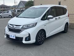 フリードハイブリッド ハイブリッド・Gホンダセンシング 1オーナー・メモリーナビ・Bluetooth・フルセグTV・DVD/CD再生・バックカメラ・ETC・両側電動スライドドア・スマートキー・後席フリップダウンモニター・LEDヘッドランプ・後部修復歴軽度 中古車画像