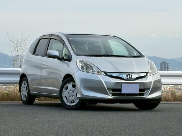 フィットハイブリッド スマートセレクション ディーラー下取り車/HDDインターナビ/バックモニター/地デジ/キセノンライト/ウィンカーミラー/スマートキー/オートエアコン(1枚目)