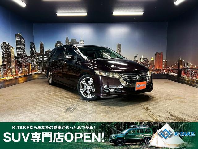 オデッセイ(ホンダ) アブソルート (禁煙車)(3列シート)(黒半革)(メーカーHDDナビ)(バックカメラ)(クルコン)(HIDヘッドライト)(オートライト)(パドルシフト)(フロントフォグライト)(フルフラット)(純正18インチAW) 中古車画像