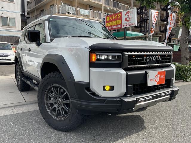 ランドクルーザー250(トヨタ) ZX 法人1オナ★純正12.3ディスプレイオーディオ★JBL★SR★茶革★デジタルインナーM★セーフティセンス★チームメイト★JAOSフルエアロ&サイドステップ&ドライブクロスホイール★ガナドールマフラー 中古車画像