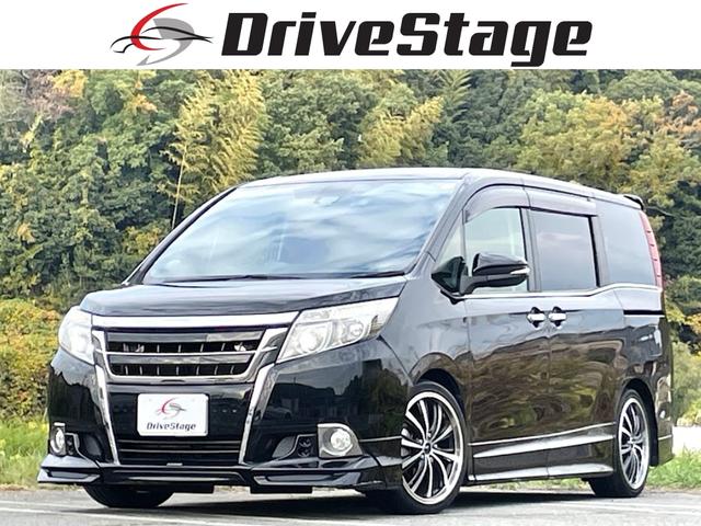 エスクァイア(トヨタ) Ｇｉ　禁煙車　ＴＲＤフルエアロ　ＴＥＩＮ車高調　純正１０インチＳＤナビ　純正後席フリップダウンモニター　社外１８ＡＷ 中古車画像