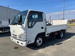 タイタントラック  2t 平ボディ 垂直パワーゲート 準中型 2トン ヒラボディ 10尺 ミッション 内フック 荷台鉄板張り 電動格納ミラー ターボ車 坂道補助装置 新明和製 ETC ドラレコ 積載量2.000kg 中古車画像