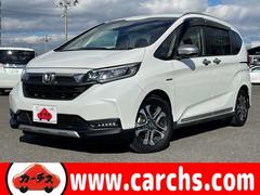フリード+ハイブリッド ハイブリッド・クロスターホンダセンシング CMBS・アダプティブクルーズコントロール&LKAS・ギャザーズSDナビ・フルセグTV・BTオーディオ・DVD再生・バックカメラ・スマートキー・両側パワースライドドア・LEDヘッド 中古車画像