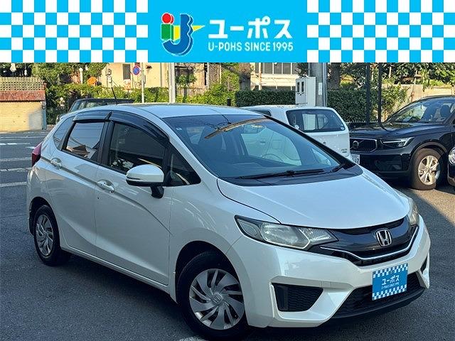 フィット １３Ｇ・Ｆパッケージ　ワンオーナー・禁煙車・純正ナビゲーションＶＸＭ－１４５ＶＳｉ・地デジテレビ・バックカメラ・前後ドライブレコーダー・ＥＴＣ・スマートキー（1枚目）