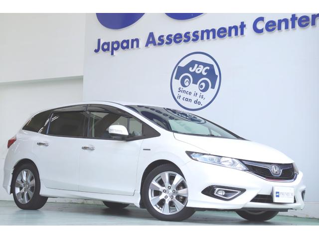 ジェイド(ホンダ) ハイブリッドＸ　ワンオーナーユーザー様直接買取車　禁煙車　車検Ｒ９年３月　ホンダセンシング　純正インターナビ　フルセグＴＶ　バックカメラ　ＬＥＤヘッドライト　ハーフレザーシート 中古車画像