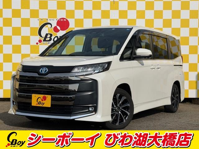 ノア(トヨタ) ハイブリッドＳ−Ｚ　ワンオーナー　禁煙車　純正１０．５ディスプレイオーディオ　全方位カメラ　トヨタチームメイト　ＢＳＭ　両側パワスラ　セーフティセンス　レーダークルーズ　ブラックハーフレザーシート　ビルトインＥＴＣ２．０ 中古車画像