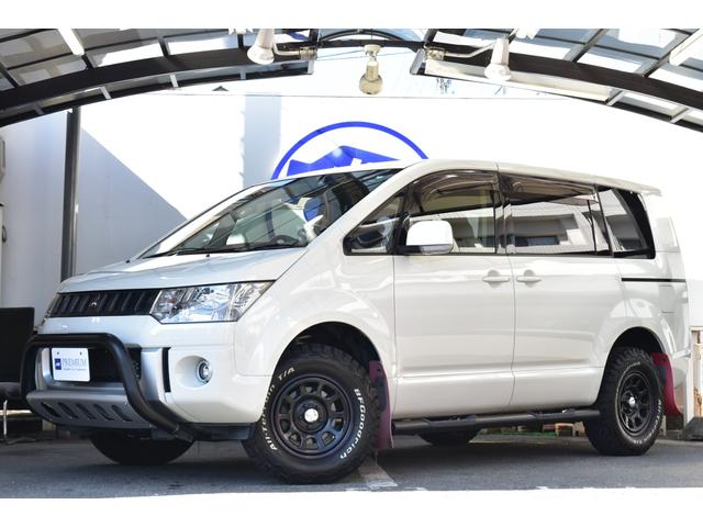 デリカD:5(三菱) D パワーパッケージ 1オーナー オートフラッグスブルバー JAOSステップ&バトルズリフトUPキット 柿本改マフラー デイトナ16ホイル アルパイン9型ナビ フルセグ Bカメラ フリップダウン ETC 両側パワスラ 中古車画像