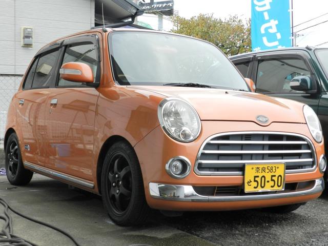 ミラジーノ(ダイハツ) プレミアムＸ　リアマフラー　テイン車高調　鍛造アルミ　ナビフルセグ　ドラレコ　ＥＴＣキティ 中古車画像