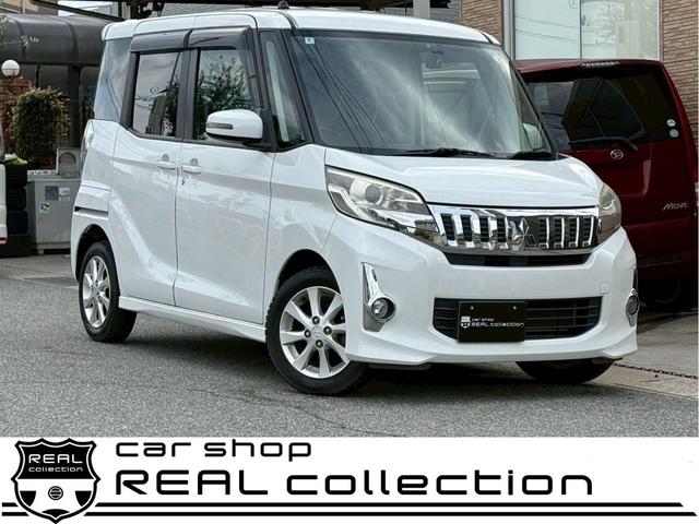 ｅＫスペースカスタム(三菱) カスタムＧ　パワースライドドア　アイドリングストップ　衝突安全ボディー　　ルームミラーバックカメラ　ドライブレコーダー　純正１４インチアルミホイール　ベンチシート 中古車画像