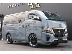 日産　キャラバン　ロンググランドプレミアムＧＸ　２．４Ｄ−Ｔ４ＷＤ４ナンバー８人３列ＲＥＶＯシート２脚ロングライドレールフローリングフルフラット対面ラウンジ前方フルスライド展開センターコンソール地ナビ後席モニターミラーリングカスタムコンプリート