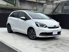 フィット リュクス 純正8型DA Bカメラ ETC ドラレコ プレミアムライトブラウンインテリア 革シート シートヒーター ステアヒーター ワイヤレス充電器 女性ワンオーナー車 禁煙 16AW LEDランプ スペアキー有 中古車画像