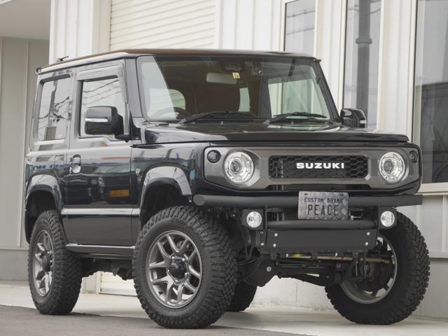 ジムニー(スズキ) ＸＣ　☆カスタム車両☆ワンオーナー・パイプバンパー・リフトアップ・ＭＴタイヤ・ナビ 中古車画像