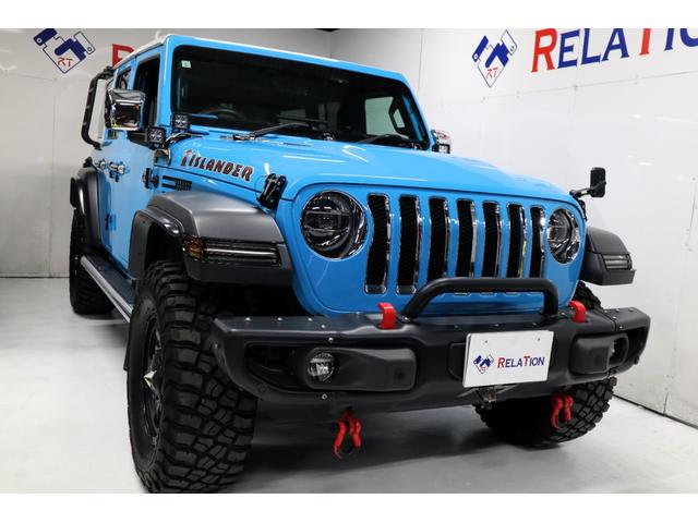 ジープ・ラングラーアンリミテッド(ジープ) アイランダー　限定車ロックスター１７ＡＷリフトアップAftermarketマフラー車検対応ボディカラーチーフＣ／ＣAftermarketバンパー専用シートサイドステップディスプレイオーディオＥＴＣＳＢカメラＬＥＤヘッドライトプッシュスタート 中古車画像