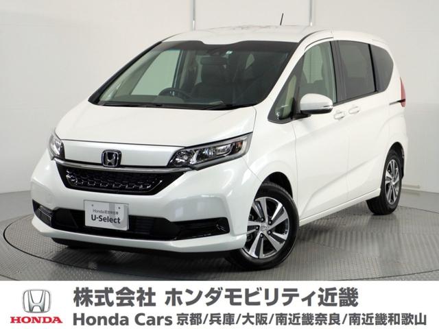 ホンダ フリードハイブリッド ハイブリッド・Ｇ　当社試乗車純正ナビＲカメラ両電扉ＥＴＣ　車線逸脱　試乗車ＵＰ　追従走行　ブルートゥース　横滑り　衝突軽減Ｂ　ハーフレザーシート　両側オートスライドドア　スマ－トキ－　後カメラ　フルセグ　ＵＳＢ　ＤＶＤ