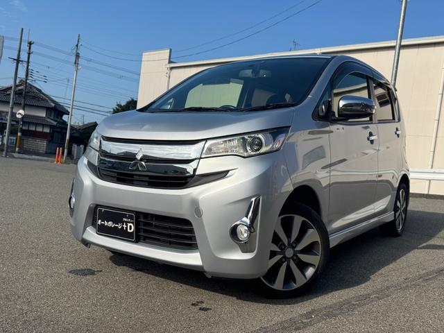 ｅＫカスタム Ｔ　禁煙車　ターボ車　イクリプスナビ　フルセグＴＶ　純正ＨＩＤ　スマートキー　プッシュスタート　ＡＢＳ　オートエアコン　ＥＴＣ　バックカメラ　電格ミラー　バイザー（1枚目）