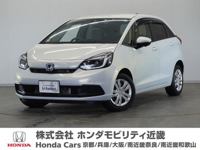 フィット ｅ：ＨＥＶホーム　令和４年式　車検令和７年１０月　走行１２，０６５Ｋｍ　タイプ（ｅ：ＨＥＶ　ＨＯＭＥ）　ボディカラー（プレミアムサンライトホワイトパール）メーカーオプションナビ（1枚目）