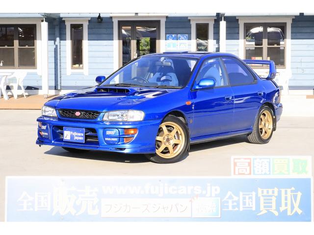 インプレッサ ＷＲＸ　ＲＡ　ＳＴｉバージョンＶＩ　リミテッド　純正ＭＯＭＯステアリング　インタークーラーウォータースプレー　ドライバーズコントロールセンターデフ　ルーフベンチレーター　ＳＴｉマフラーＳＴｉタワーバー　ＬＡＭＣＯブースト計・３連メーター　リヤスポ