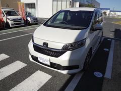 フリードハイブリッド ハイブリッド・Gホンダセンシング 純正9インチナビ フルセグTV Bluetooth バックカメラ ETC ナビ連動前後ドライブレコーダー シートヒーター LED アルミ 両側電動ドア 衝突軽減ブレーキ 追随機能付きオートクルーズ 中古車画像