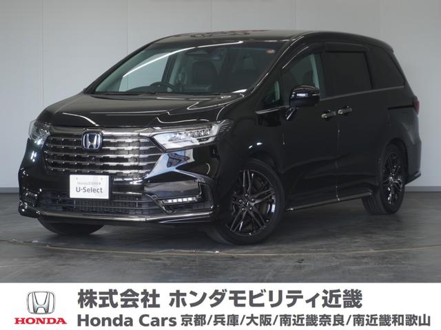 オデッセイハイブリッド(ホンダ) ｅ：ＨＥＶアブソルート・ＥＸ　２年保証ナビ全周囲カメＤレコＥＴＣ両電扉ＢＴ地デジ　渋滞追従クルーズ　ブラインドスポット　後退出庫サポート　シートヒーター　障害物センサー　１８インチ純正アルミホイール　電動オットマン　本革使用シート 中古車画像