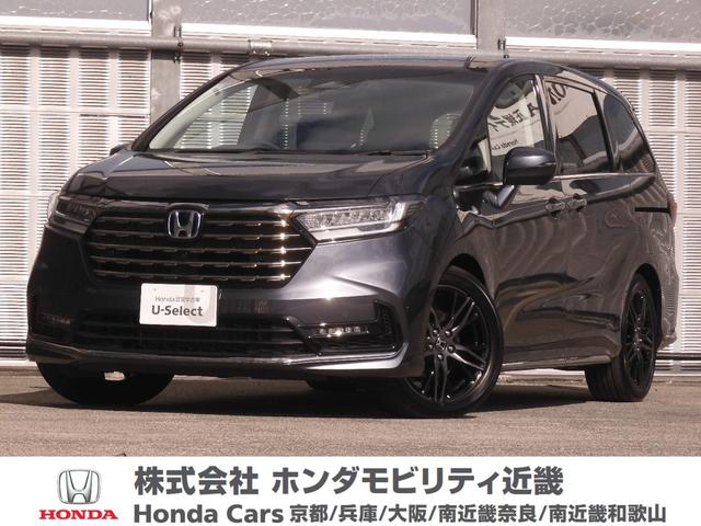 オデッセイハイブリッド(ホンダ) ｅ：ＨＥＶアブソルート・ＥＸ　デモカー　１１．４インチナビ＋全周囲カメラ　ナビ連動ドラレコ＋ＥＴＣ　レザーシート　１・２列目シートヒーター付電動シート　３ゾーンコントロールエアコン　ハンズフリー電動テールゲート　１８インチアルミ 中古車画像