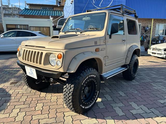 ジムニー(スズキ) ランドベンチャー　リフトアップ　オーバーフェンダー　ブロックタイヤ　左右サイドステップ　ルーフキャリア　Aftermarket１５インチＡＷ　Aftermarketステアリング　Aftermarketマフラー 中古車画像