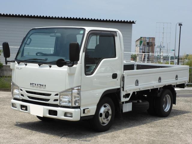 エルフトラック 　平ボディー　スムーサー　オートマ　ＡＴ　積載２ｔ　総重量５ｔ未　鉄板張　キーレス　ナビゲーション　ＴＶ　Ｂｌｕｅｔｏｏｔｈ　ＥＴＣ　左電動格納ミラー（1枚目）