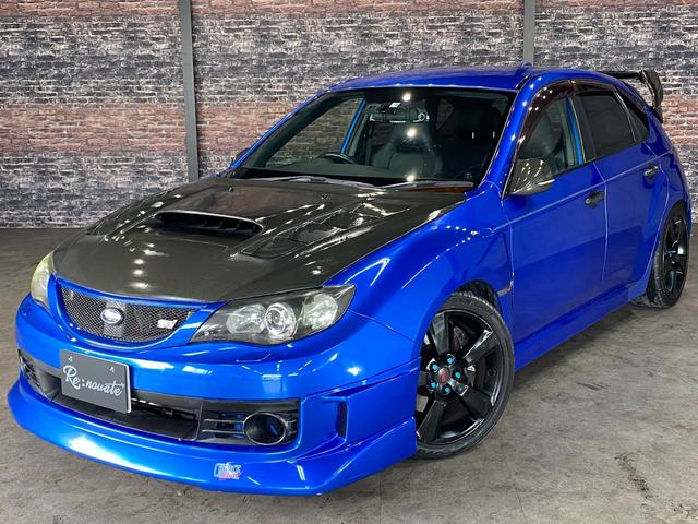 ＷＲＸ　ＳＴｉ　タイベル交換済・エンジンＯＨ済・ＢＲＩＴＺ車高調・ＶＡＲＩＳカーボンウイング＆カーボンボンネット・ＴＯＭＥＩエクストリームＴｉマフラー・ＣＨＡＲＧＥ　ＳＯＥＥＤエアロ・スマートキ・ＨＩＤ・禁煙・修復無