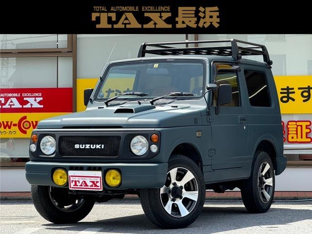 ジムニー ワイルドウインド　ターボ・４ＷＤ・全塗装・外ＣＤオーディオ・外リモコンキー・外シートカバー・規格外純正１６インチＡＷ・外Ｒキャリア・Ｆフォグ・ボディ同色塗装ハイメンタイヤハードカバー・内装木目調張替・バイザー・マット（1枚目）