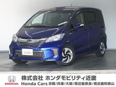 フリードハイブリッド ジャストセレクション 1年保証ナビ後席モニタRカメETC両電扉BT ナビテレビ セキュリティー 横滑り防止機能 オートクルーズ 地デジ エアバック DVD再生可能 キーレスエントリー PS 3列 フルオートエアコン ABS 中古車画像