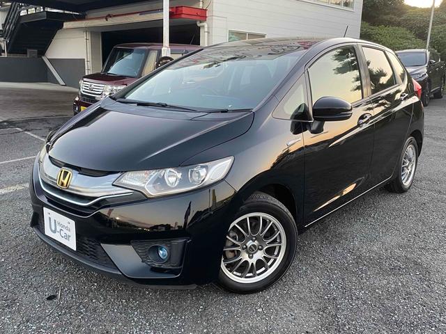 フィットハイブリッド(ホンダ) Lパッケージ ETC バックカメラ TV オートクルーズコントロール LEDヘッドランプ スマートキー AT 盗難防止システム 衝突安全ボディ アルミホイール CD USB 中古車画像