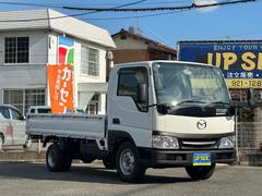 タイタンダッシュ ロングワイドローDX 2.0ガソリン フロア5速 積載量1500kg ダブルタイヤ 電動格納ミラー 運転席エアバッグ ETC レベライザー 取扱説明書 点検記録簿 中古車画像