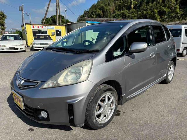 フィット（ホンダ）Ｌ　ハイウェイエディション　ＥＴＣ　バックカメラ　ナビ　ＴＶ　クリアランスソナー　アルミホイール　オートライト　ＨＩＤ　キーレスエントリー　電動格納ミラー　チップアップシート　ＣＶＴ　盗難防止システム　衝突安全ボディ　ＡＢＳ 中古車画像