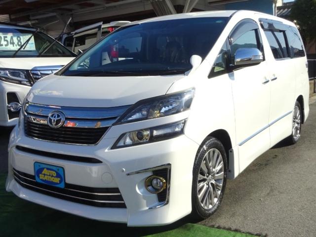 ヴェルファイア(トヨタ) ２．４Ｚ　ゴールデンアイズＩＩ　アルパイン９型ＳＤナビ　地デジ　Ｂカメラ　後席モニター　ＢＴ　ＵＳＢ　クルコン　クリアランスソナー　ハーフレザーシート　７人乗りオットマン　パワーバックドア　両側自動ドア　全国対応２年保証 中古車画像