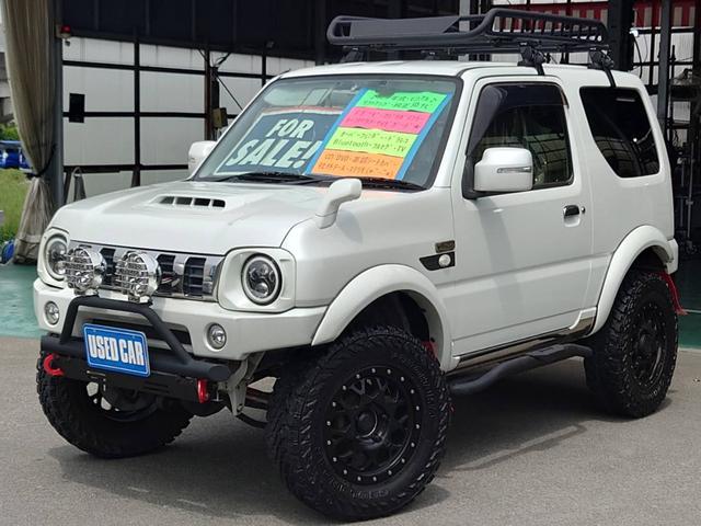 ランドベンチャー　１０型５ＭＴ　／４ＷＤ　リフトアップ　純正ナビ　Ｆグリルガード　フジツボマフラー　ルーフキャリア　サイドガード　けん引フック　オーバーフェンダー　ドラレコ　フルセグＴＶ　Ｂｌｕｅｔｏｏｔｈ　シートヒーター　革調シートカバー　社外テール