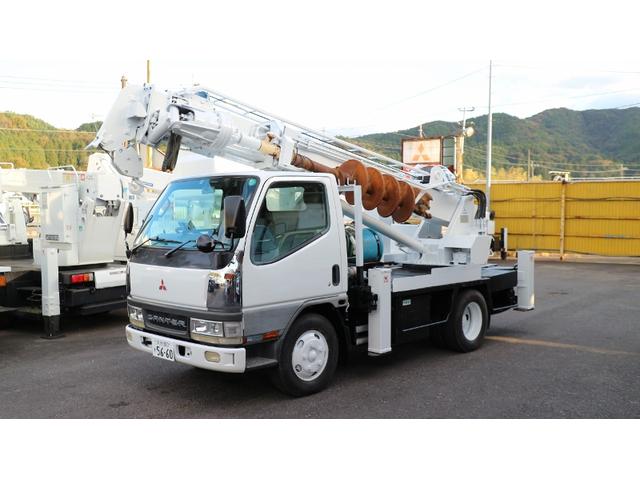 三菱ふそう キャンター アイチ穴堀建柱車ｄ５０２の中古車 車体価格409 5万円 1999 平成11 年式 走行12 9万キロ 車体色ブルー 大分県大分市上戸次４７１０ ３ 有限会社 オートサロンかわのの在庫 グーネット中古車