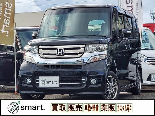 ホンダ Ｎ－ＢＯＸカスタム Ｇ・Ｌパッケージ　社外８インチナビ・フルセグＴＶ・Ｂｌｕｅｔｏｏｔｈ・バックモニター・純正１４インチアルミ・片側パワースライドドア・プッシュスタート・スマートキー・ＨＩＤヘッドライト・フォグランプ・アイドリングストップ