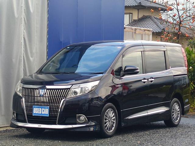 エスクァイア(トヨタ) ハイブリッドＧｉ　ワンオーナー　モデリスタエアロ　純正９インチＳＤナビ　フルセグ　ブルートゥース　ＨＤＭＩ　フロントカメラ　バックカメラ　両側電動スライドドア　オートクルーズ　合皮レザーシートヒーター　記録簿　禁煙車 中古車画像