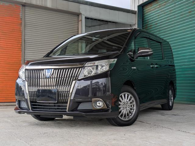 エスクァイア(トヨタ) ハイブリッドＧｉ　ブラックテーラード　★ワンオーナー★純正１５インチアルミ★革シート★純正９インチナビ★Ｔｏｙｏｔａ　Ｓａｆｅｔｙ　Ｓｅｎｓｅ　★フルセグＴＶ★Ｂｌｕｅｔｏｏｔｈ★バックカメラ★両側パワスラ★シートヒーター★クルコン★ 中古車画像