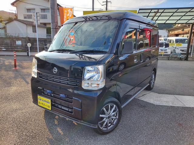 ＮＶ１００クリッパーバン ＤＸ　ハイルーフ　５ＡＧＳ車　４ＷＤ　オートマ　フル装備　ＤＶＤナビ　ワンセグ　社外タコメーター　ＬＥＤライト　ＥＴＣ　リヤスポイラー　社外アルミ付（1枚目）