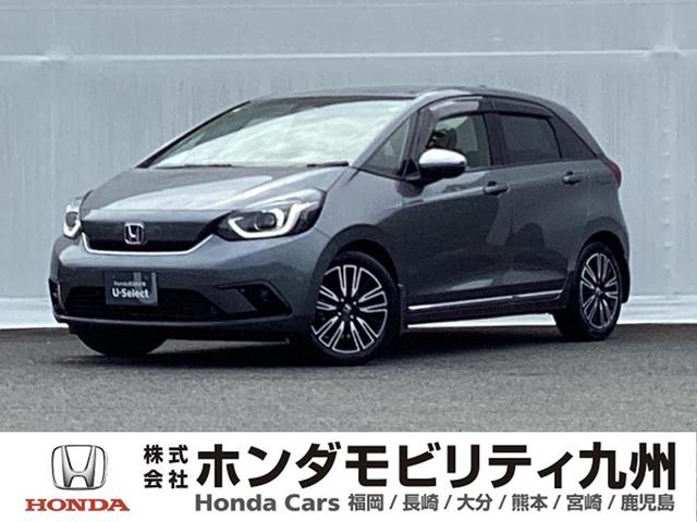 フィット リュクス　メモリーナビ　リアカメラ　シートヒーター　衝突軽減　ＬＥＤヘッドランプ　パワステ　エアコン　パワーウインドウ　キーレス　Ｉストップ　カーテンエアバッグ　ＡＢＳ　ＤＶＤ再生　クルコン　イモビライザー（1枚目）