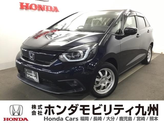 フィット ｅ：ＨＥＶホーム　メモリーナビ　リアカメラ　ドラレコ　前後ブレーキサポート　盗難防止　クリアランスソナー　ＥＣＯモード　バックガイドモニター　ナビ＆ＴＶ　スマートキー　ＬＥＤヘッドライト　オートクルーズ　地デジフルセグ（1枚目）
