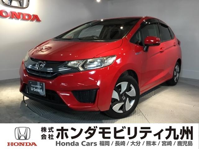 フィットハイブリッド Ｆパッケージ　メモリーナビ　ＥＴＣ　リアカメラ　地デジＴＶ　盗難警報装置　ＡＵＴＯエアコン　助手席エアバック　ＥＣＯＮ　リヤカメラ　ＵＳＢ　ＡＢＳ付　ＤＶＤ視聴　横滑り防止システム　キーレスエントリー　ナビテレビ（1枚目）