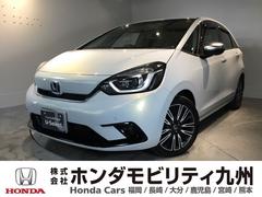 フィット e:HEVリュクス リアカメラ シートヒーター ETC 誤発進抑制機能 LED クルーズコントロール セキュリティアラーム DVD VSA フルセグ サイドエアバッグ スマートキー キーレス 助手席エアバッグ ABS 中古車画像